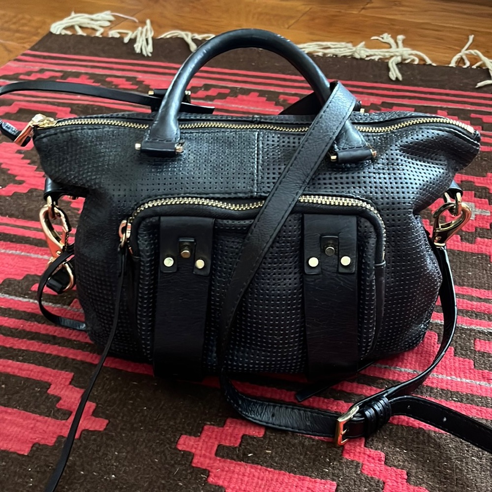 Great looking black perforated leather satchel